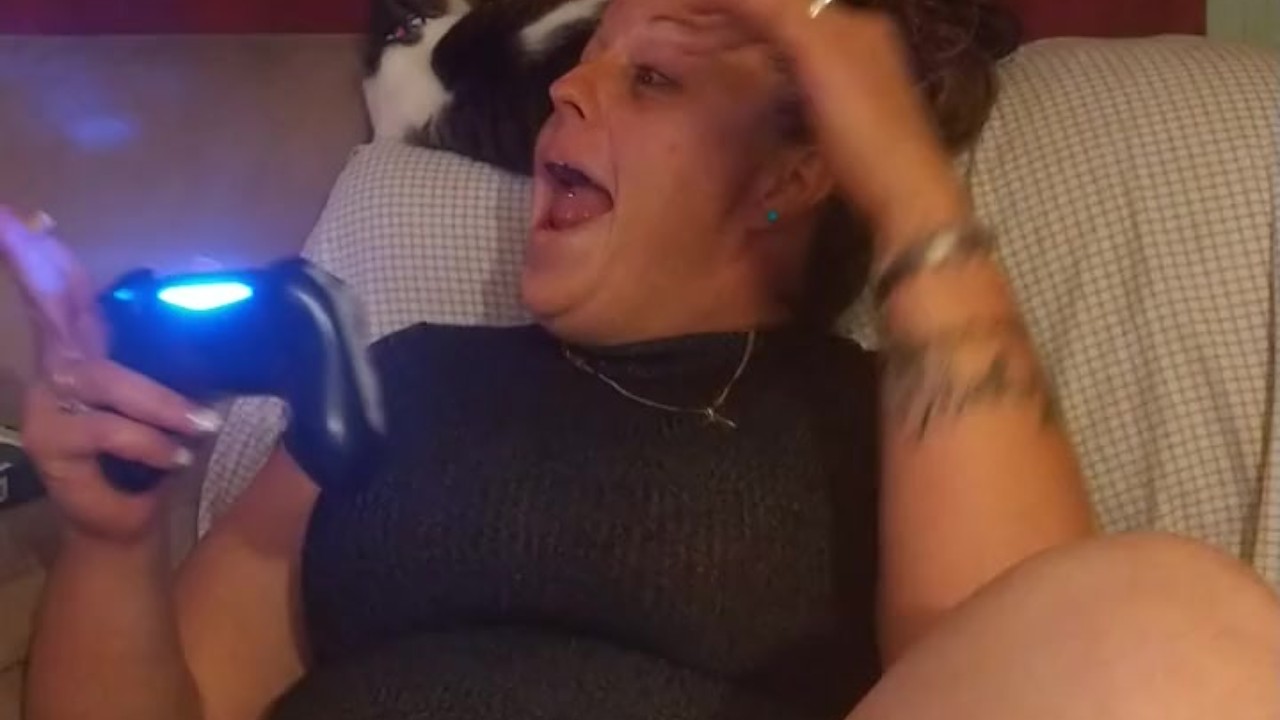 Sexy Step Mom Secretary Upskirt Teasing Spreading Legs Wide and Smoking While Playing Video Games