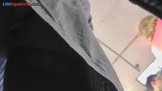 Hot upskirt porn with a slim gal in a public place