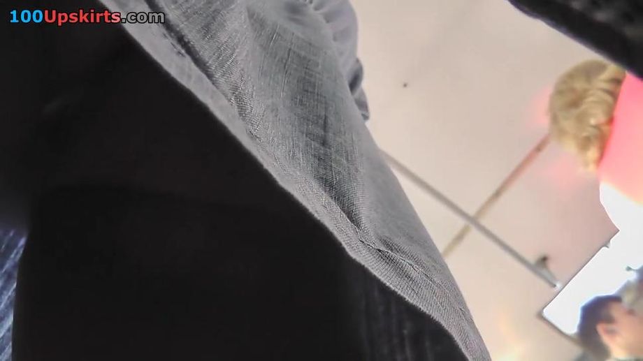 Hot upskirt porn with a slim gal in a public place